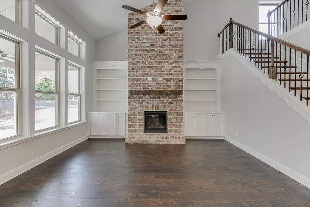 Floor to Ceiling Rustic Brick Fireplace