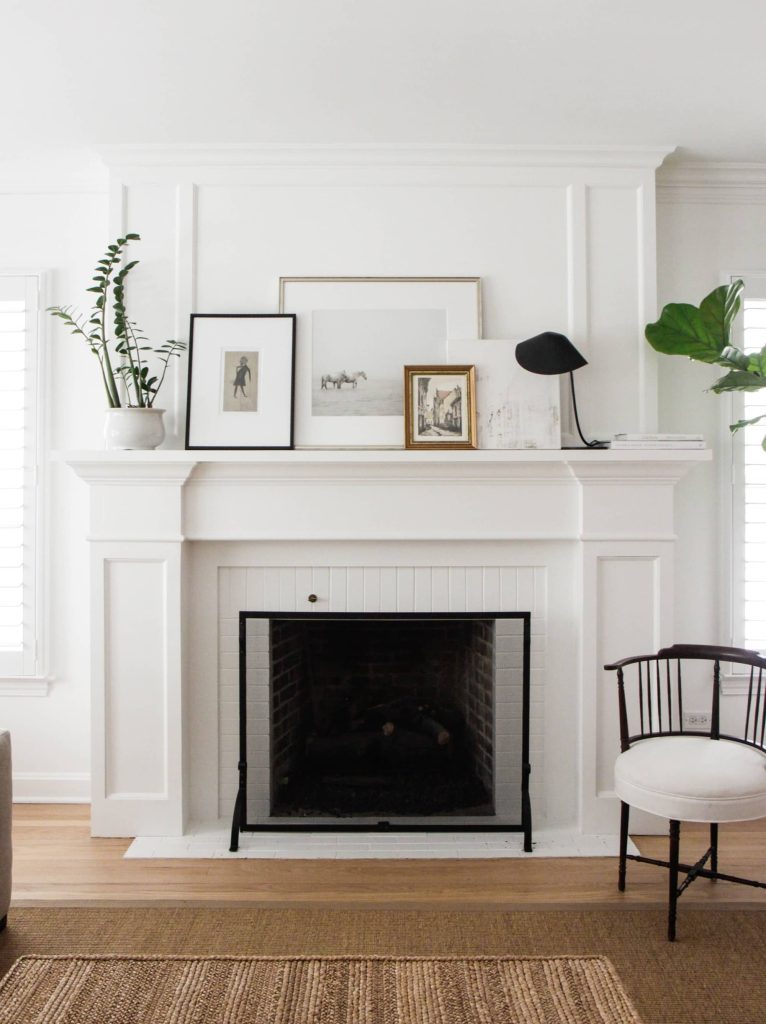 Mantel Over a White Brick Fireplace