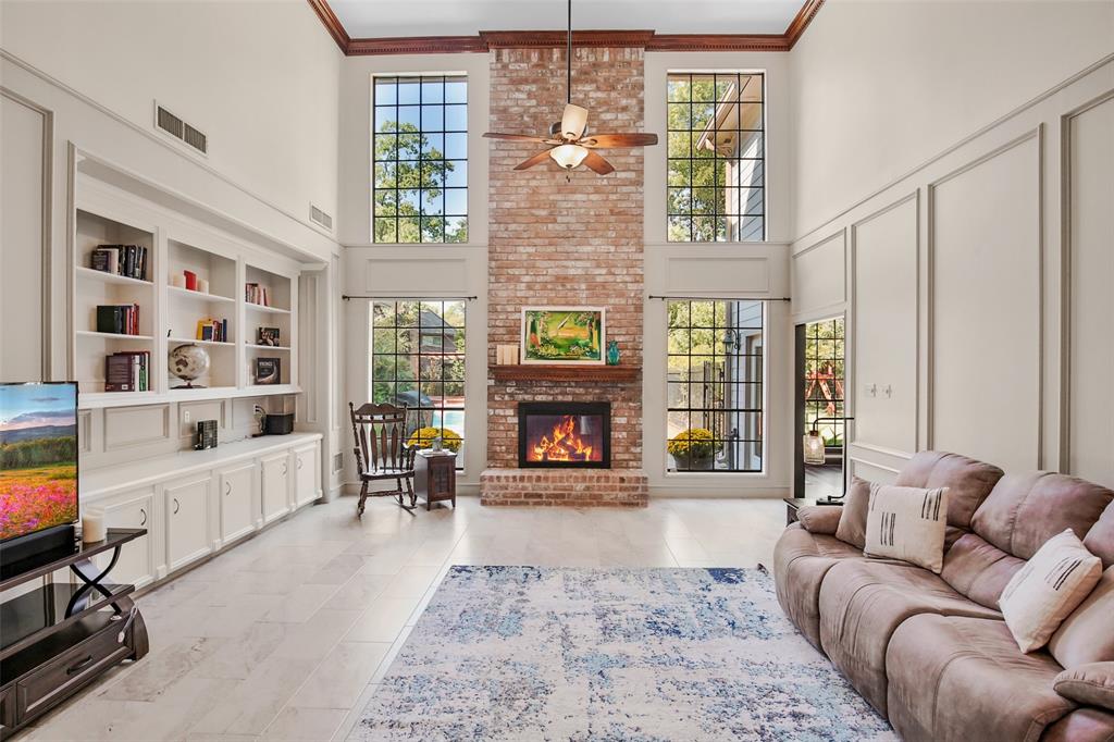 Two-Story Living Room Brick Fireplace