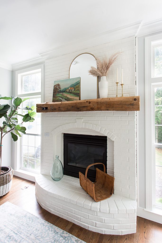 White Fireplace with Wood Mantel