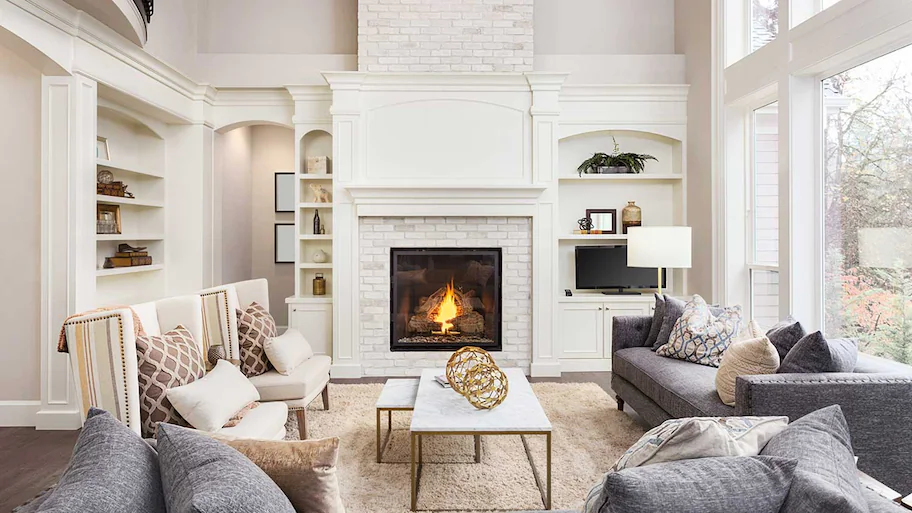 White Painted Brick Floor to Ceiling Fireplace
