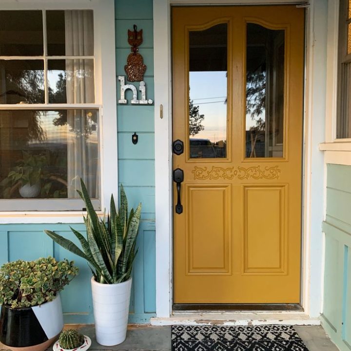 Warm Mustard Door with Sea Green Accents