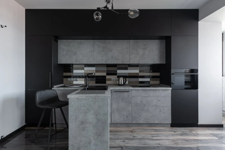 gray countertop with black chair