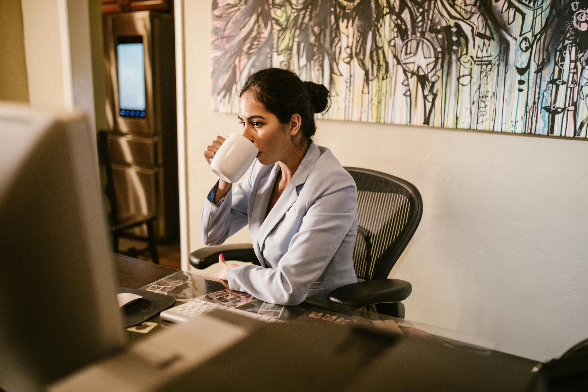 Employee Working While Sitted on an Ergonomic Chair