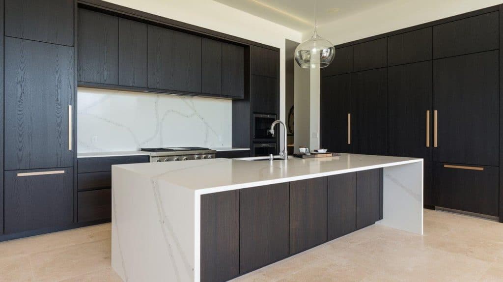 Modern Black Cabinets with White Waterfall Peninsula