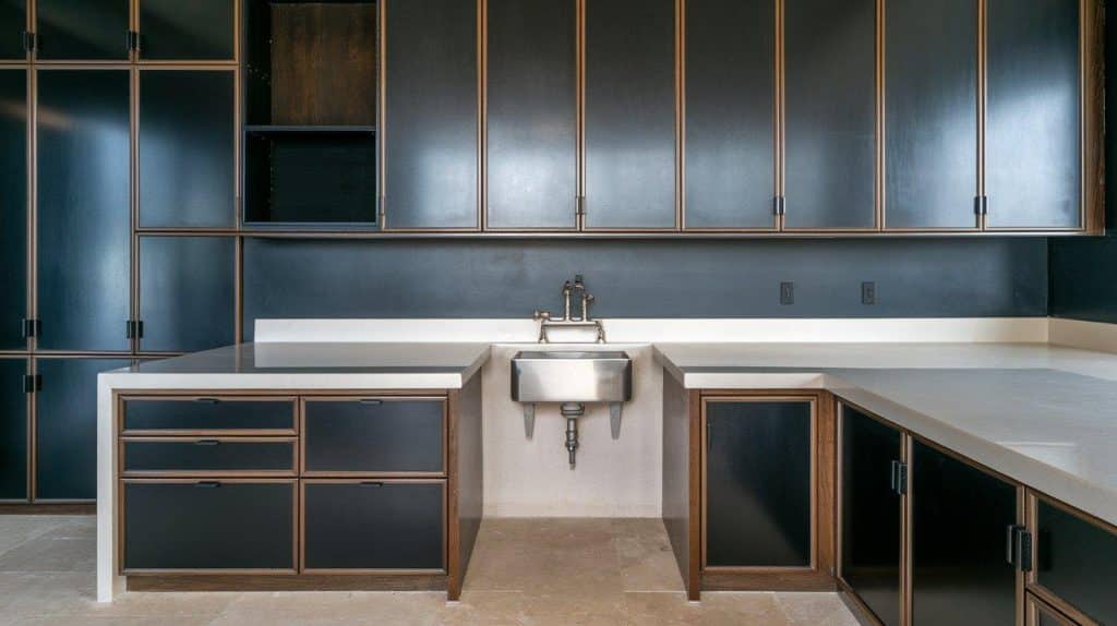 Slim-Frame Black Cabinets with Crisp White Tops
