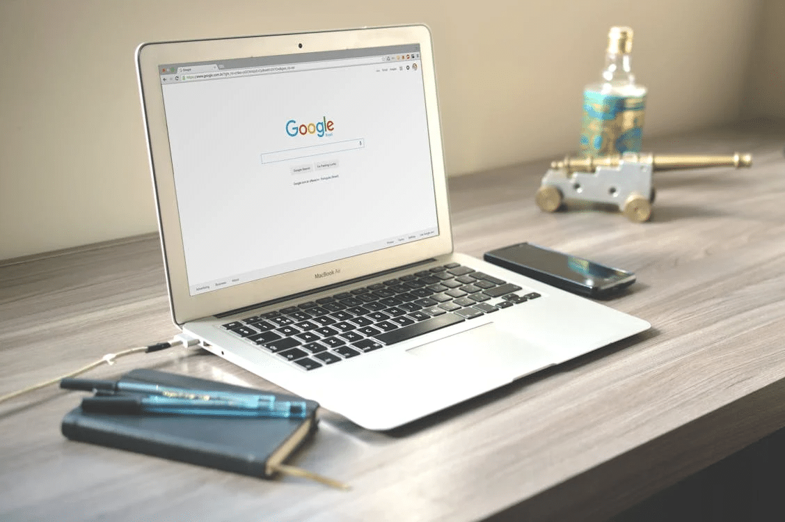 A computer on a table AI-generated content may be incorrect.