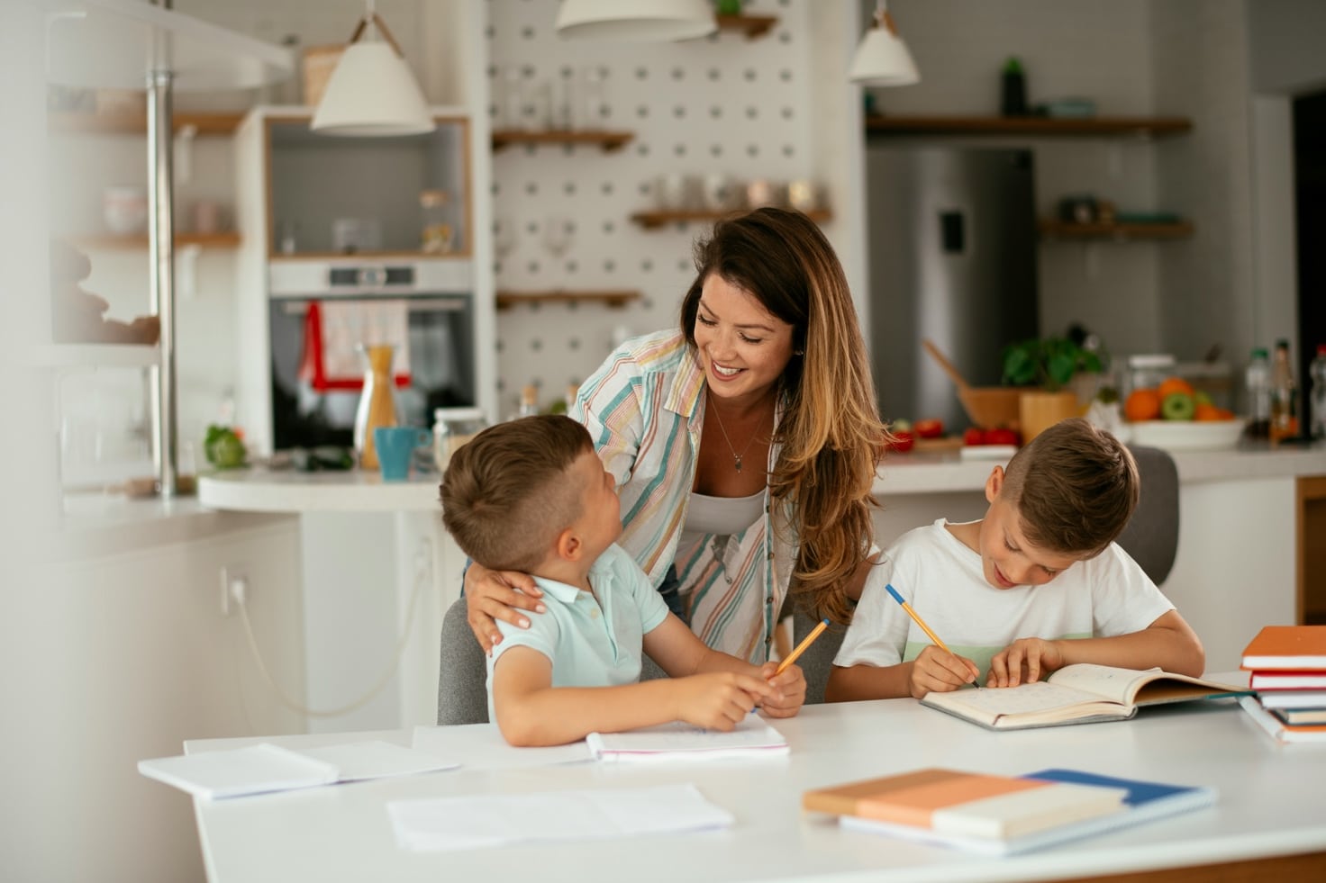 A person helping children with homework AI-generated content may be incorrect.