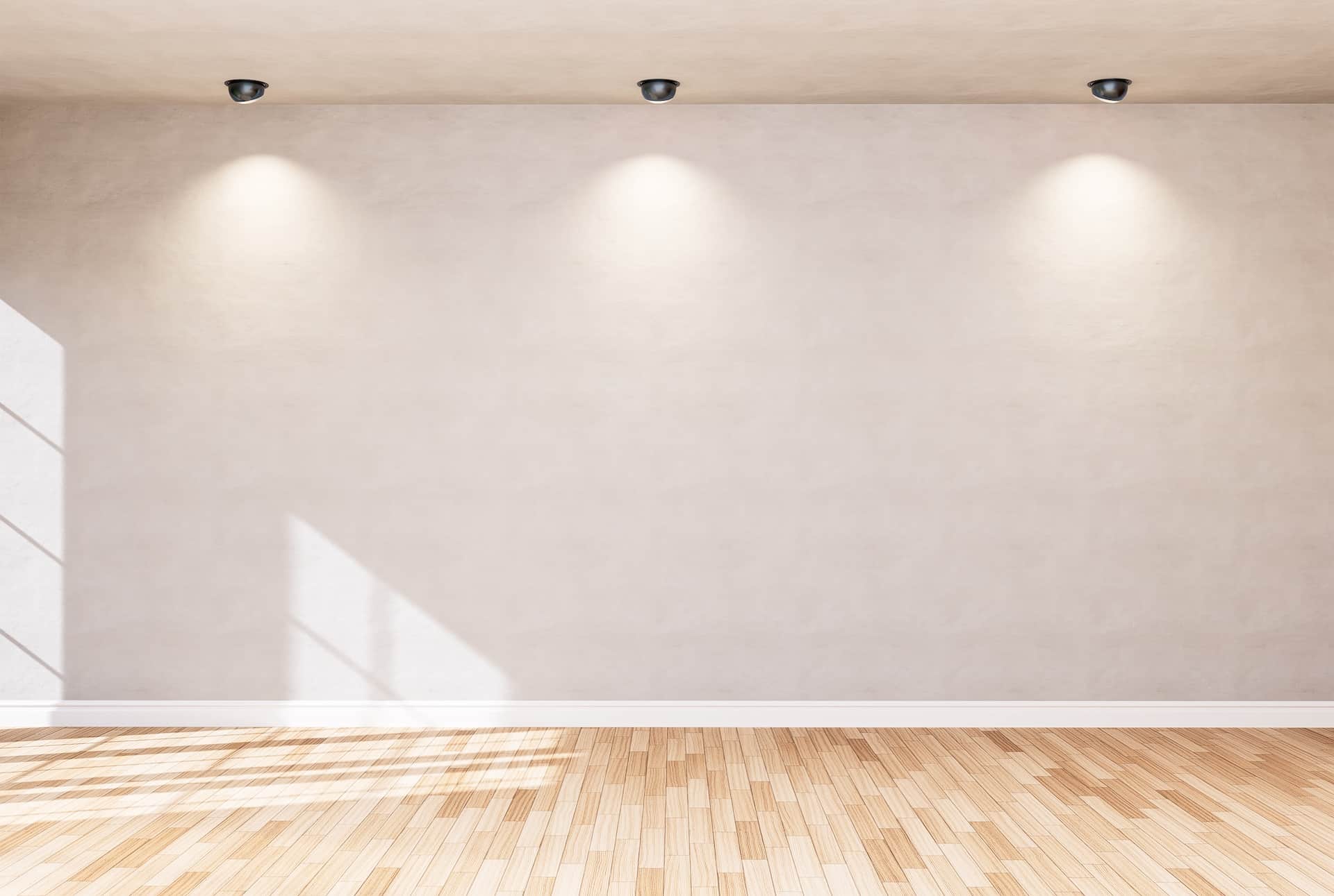 Empty room color wall and decorated with wooden floors.